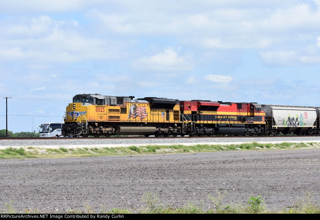 UP 8825 South on KCS grain train